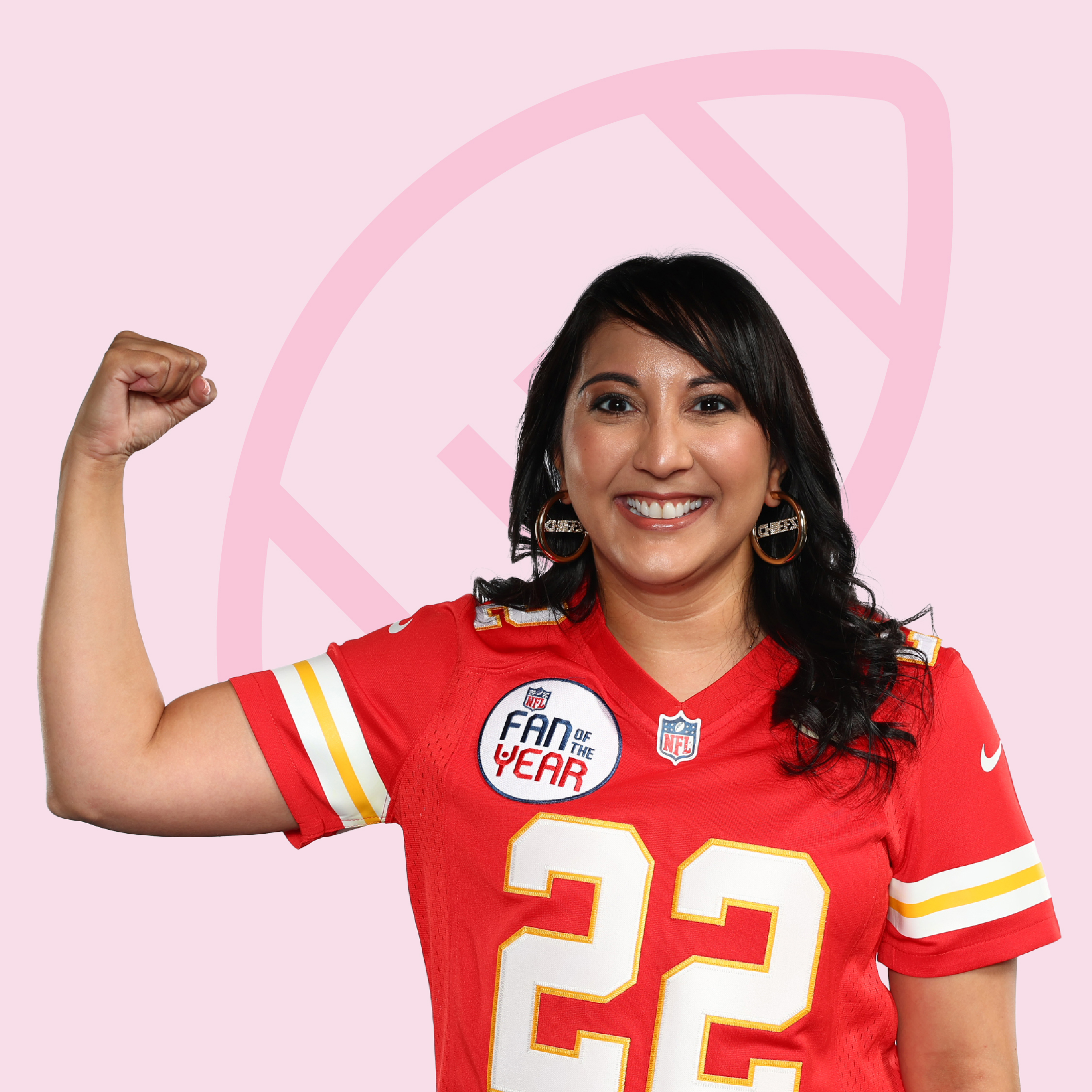 Dr. Patel wearing her Fan of the Year Chiefs Jersey